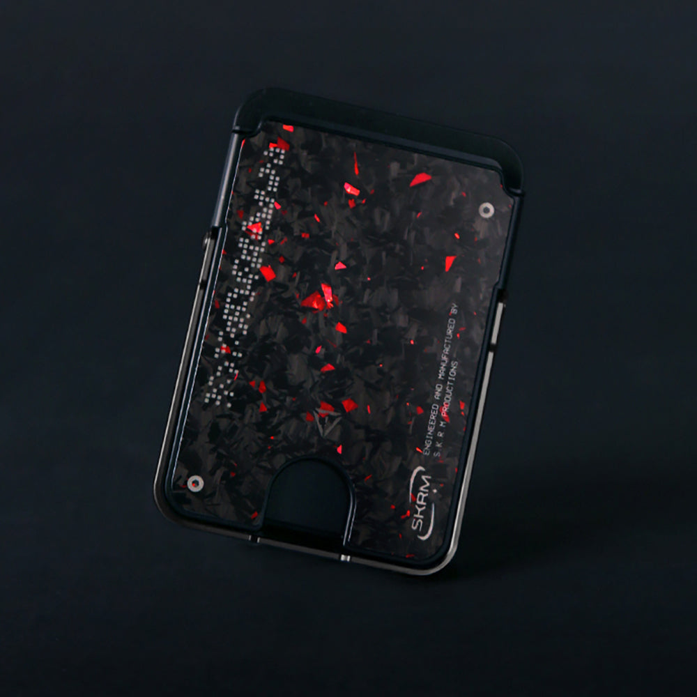 Skinarma Vektor Kablosuz ve PD Hızlı Şarj Özellikli Metal Standlı Taşınabilir Powerbank 15W 5000mAh Siyah-Kırmızı